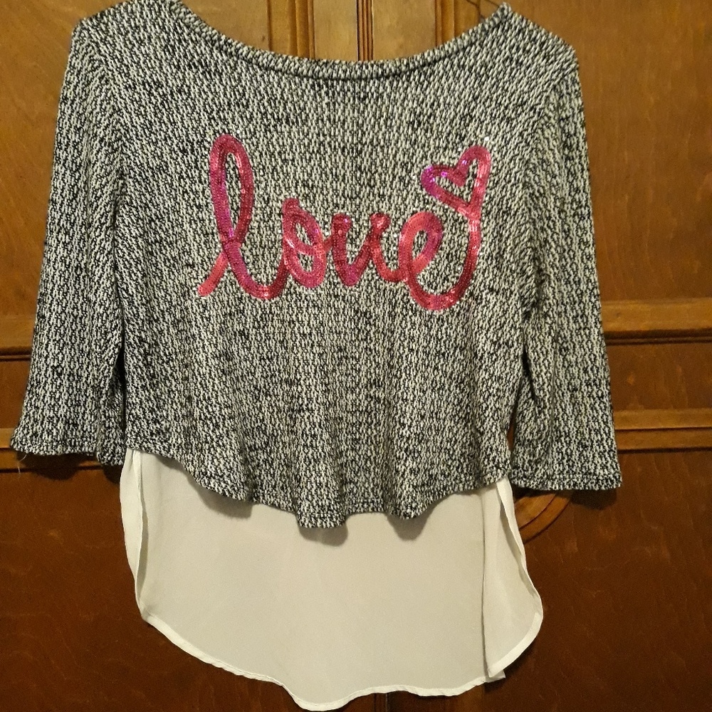 A knit shark bottom shirt all ready for love